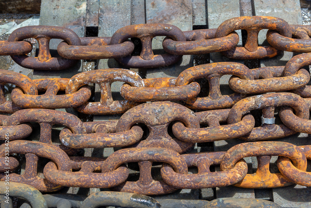 Rusty anchor chain in dry dock Rusty anchor chain in dry dock
