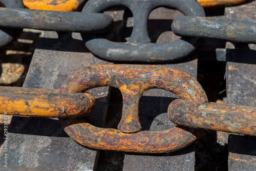 Rusty anchor chain in dry dock Rusty anchor chain in dry dock