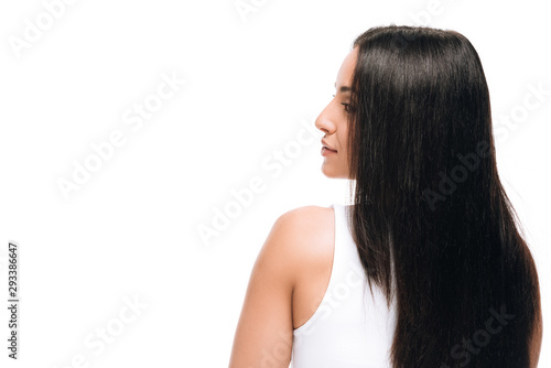 back view of brunette beautiful woman with long straight healthy and shiny hair isolated on white