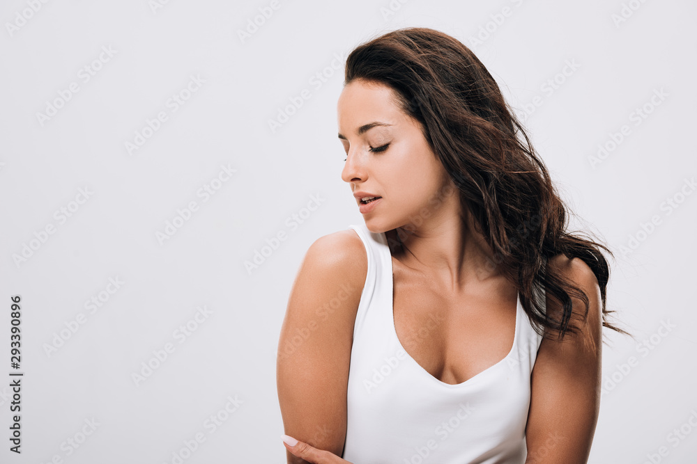brunette beautiful woman with closed eyes, long healthy and shiny hair isolated on grey brunette beautiful woman with closed eyes, long healthy and shiny hair isolated on grey