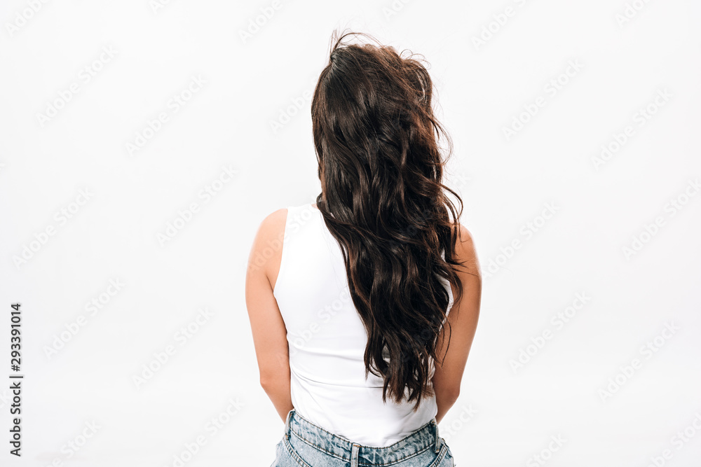 Obraz premium back view of brunette beautiful woman with long healthy and shiny hair isolated on white