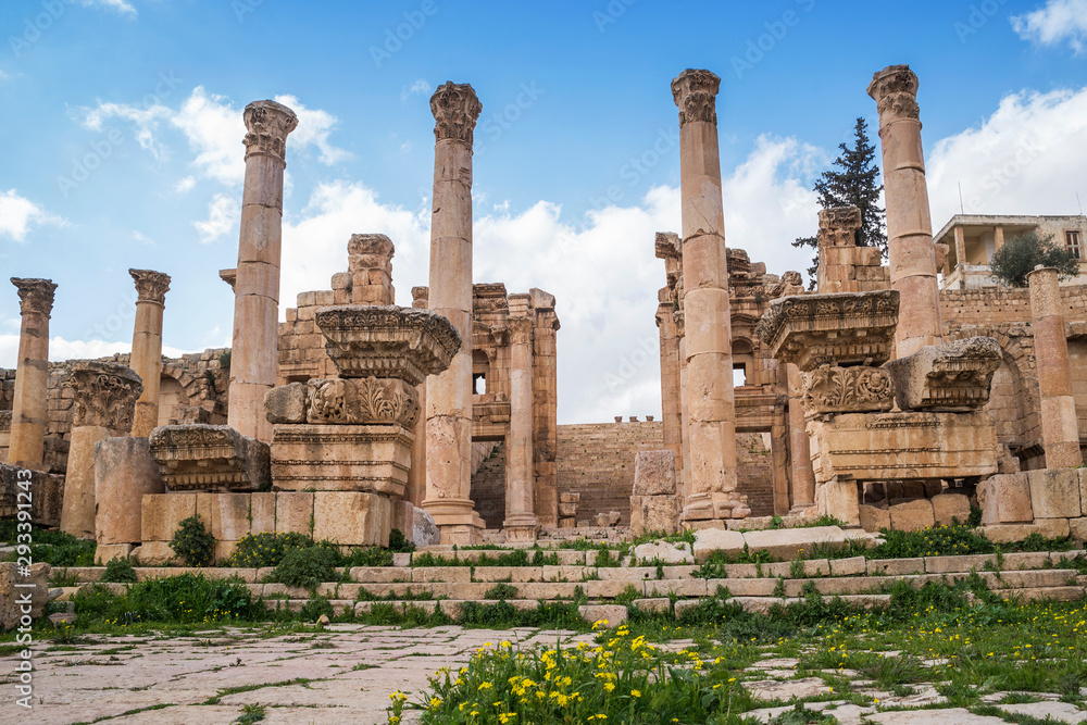 Columns with decorative ornaments in the ancient roman city ruins of Jerash, Gerasa Governorate, Jordan
