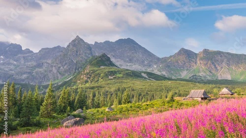 Timelapse clouds over colorful mountains