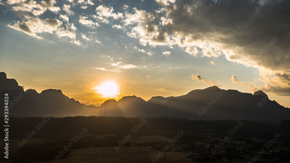 Fototapeta premium Beautiful sunset on the mountains in laos