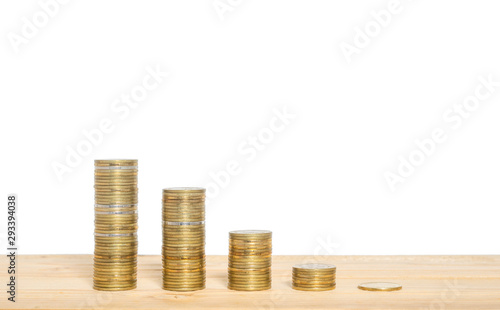 coins stack on wood table with white background. financial and money saving concept.