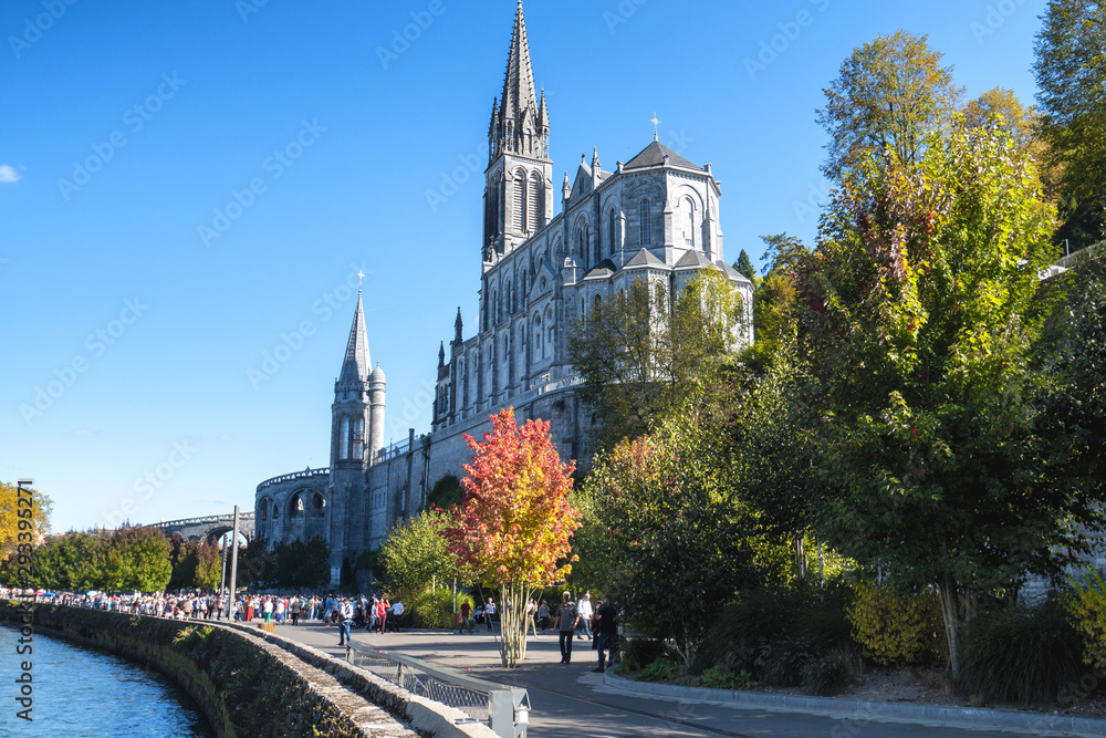 Fototapeta premium View of the basilica of Lourdes city, France