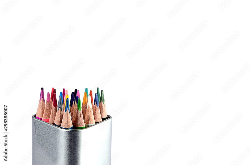 Sharpened colored pencils bunch in tin box isolated on white ground Sharpened colored pencils bunch in tin box isolated on white ground