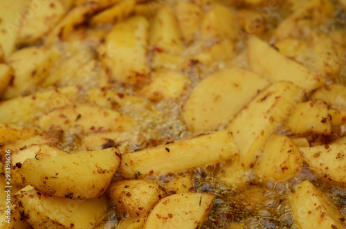 Roasting delicious french fries with natural spices
