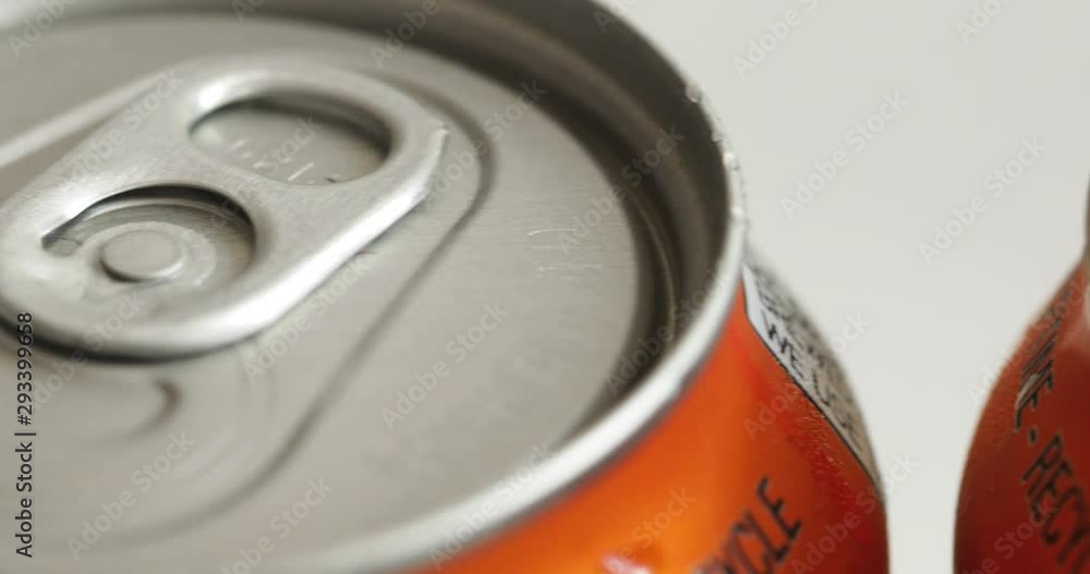 Video Slide Across Close Up Tops Of Beer Cans Video Slide Across Close Up Tops Of Beer Cans