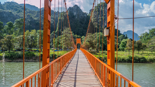 Hiking on the famous bridge in Laos