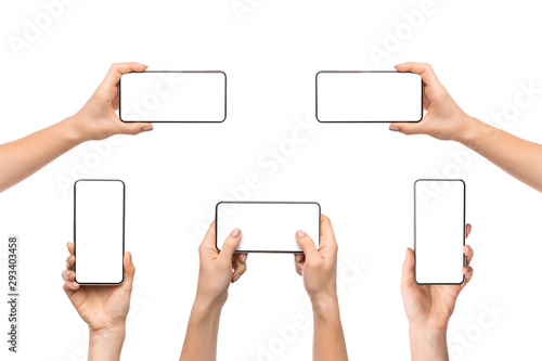 Collection of female hands holding smart phone with empty screen
