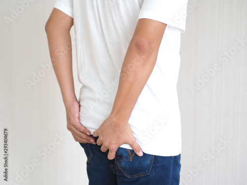 anorectal abscess and anal fistula and strongyloidiasis in asian man symptom of pain and suffering his anus use for health care concept.