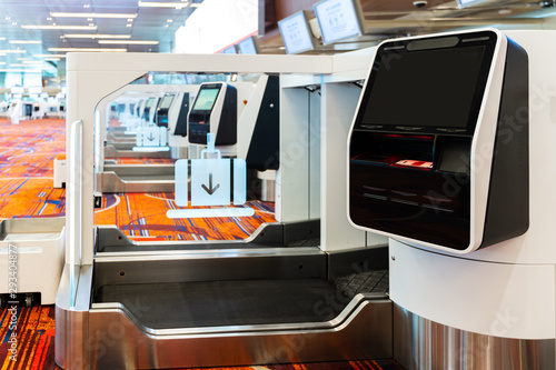 Self-service check-in and drop-off machines can print Boarding pass, manage booking in the international airport Provide service to passengers increase the speed of service in transportation concept. © boophuket