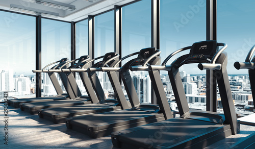 Foto Modern gym with Treadmills near big panoramic windows in skyscraper, 3d rendering