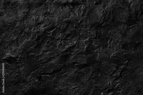 Seamless black rough concrete wall texture background. dark cement wall. grey plaster texture. blank for the designer