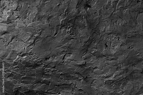 Seamless black rough concrete wall texture background.  dark cement wall.  grey plaster texture. blank for the designer