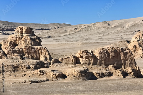 Yardangs-wind eroded rock and bedrock surfaces-alternating ridges and furrows-Qaidam desert-Qinghai-China-0534 photo