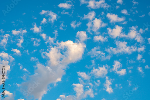 blue sky background with a tiny clouds.