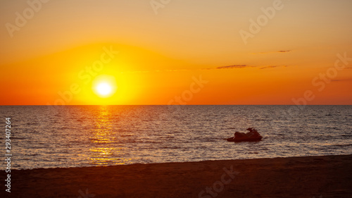 Water scooter on the water surface of the Black Sea at sunset  Poti  Georgia.