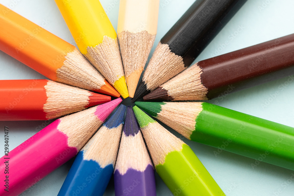 Top view of colourful crayons or colour pencil set in range isolated on pastel indigo blue background.Education,Business office and Arts Concept.Copy space empty blank for text.Back to school Top view of colourful crayons or colour pencil set in range isolated on pastel indigo blue background.Education,Business office and Arts Concept.Copy space empty blank for text.Back to school