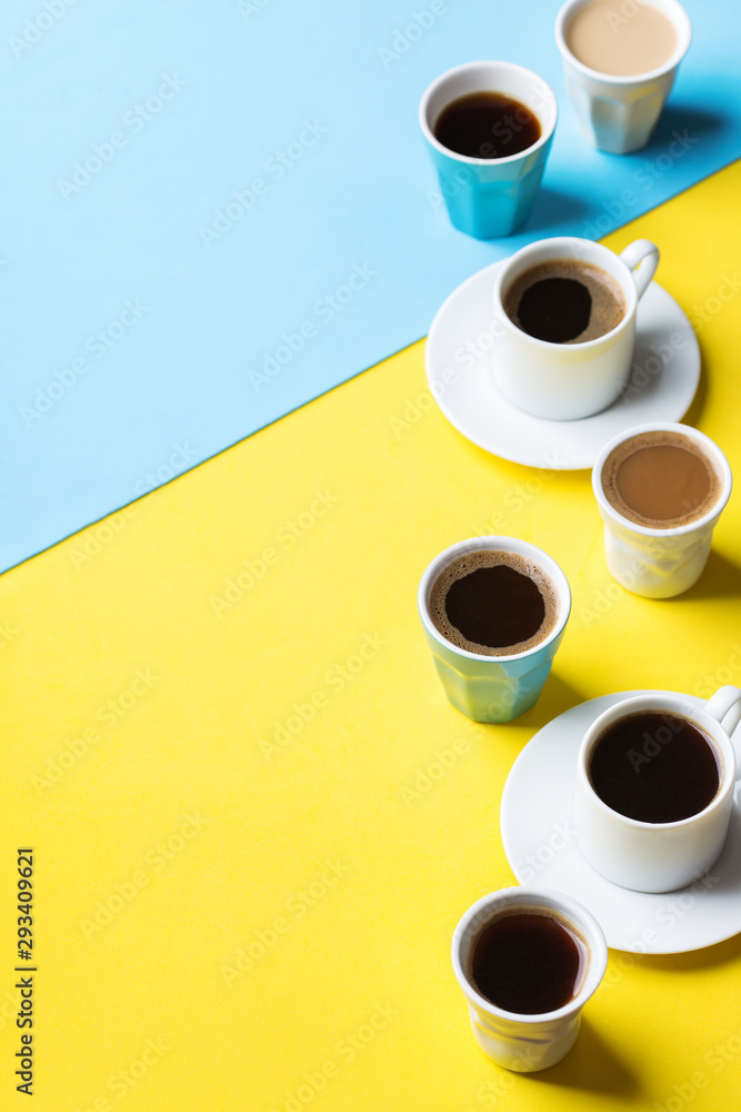 Creative flat lay with assortment of coffee cups Creative flat lay with assortment of coffee cups
