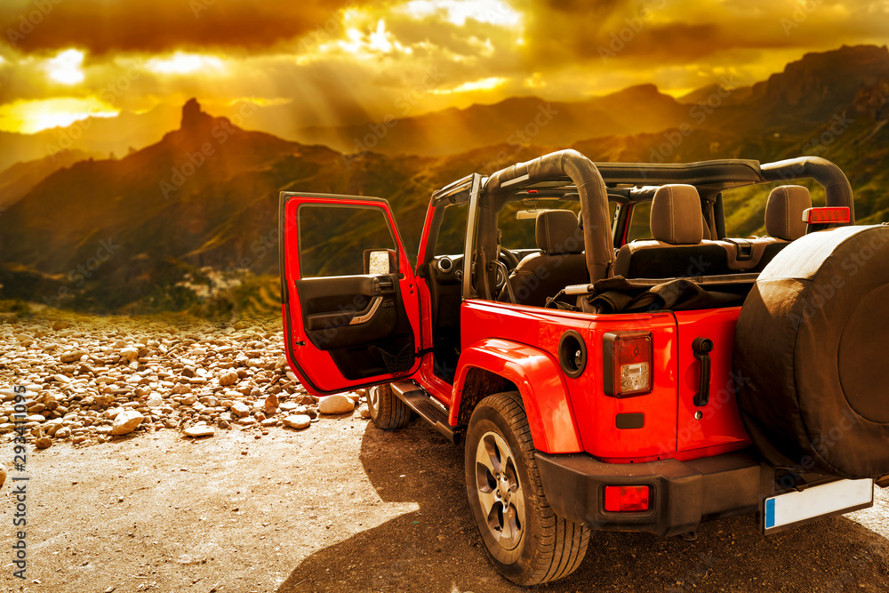 Red winter car and landscape of mountains Red winter car and landscape of mountains