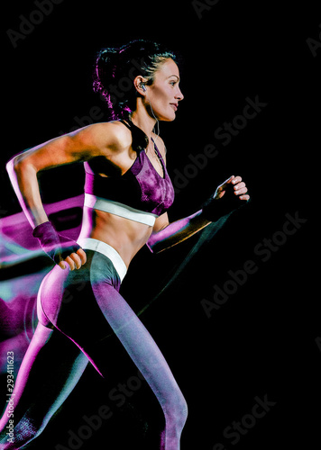 one beautiful caucasian mixed race woman unner jogger jogging running in studio isolated on black background photo