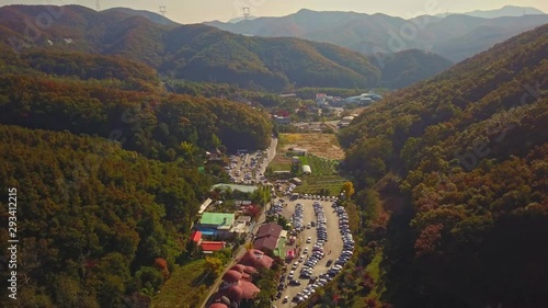 Aerial video of autumn season at Waujeongsa temple located in Yongin city, South Korea. photo