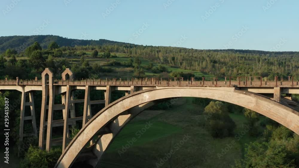 Aerial view of old bridge surroundings, pan right Aerial view of old bridge surroundings, pan right