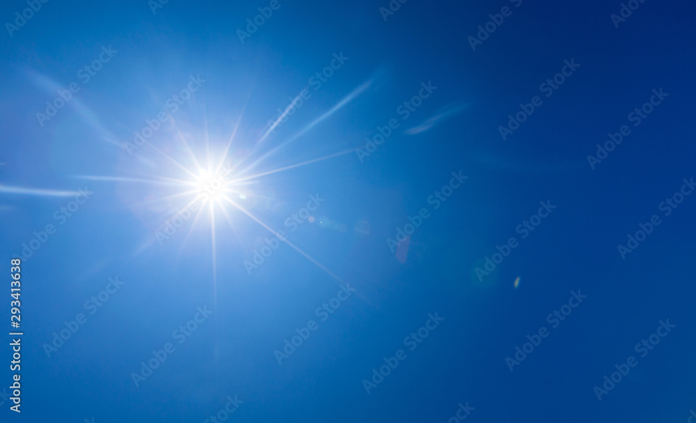 sun in blue sky with clouds closeup sun in blue sky with clouds closeup