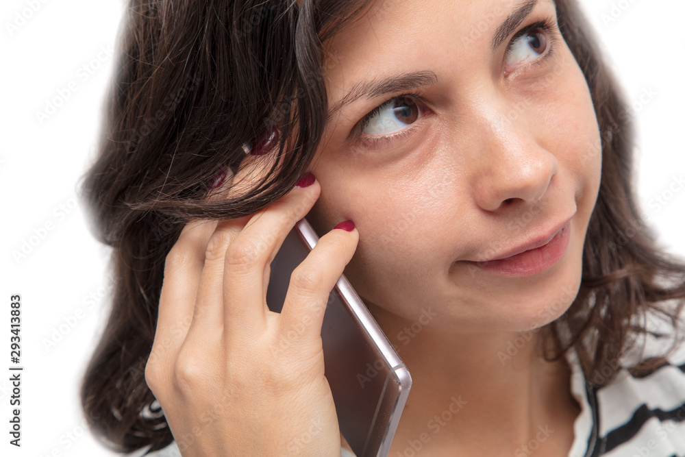 Girl talking on the phone on a white background Girl talking on the phone on a white background