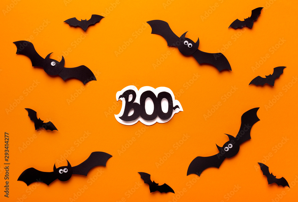 Fearful Halloween background with boo text and black bats
