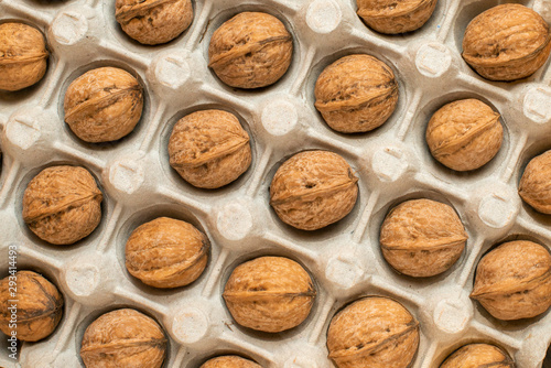 nuts on egg carton. view from above