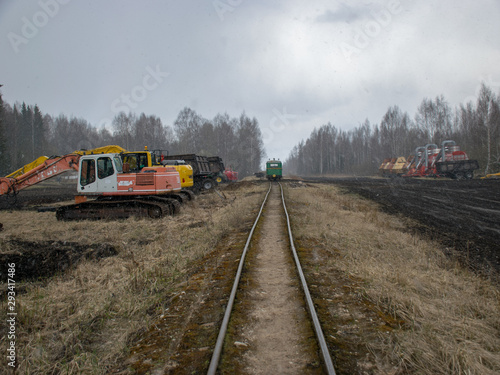 landscape with railway tracks in the bog, peat extraction bog 