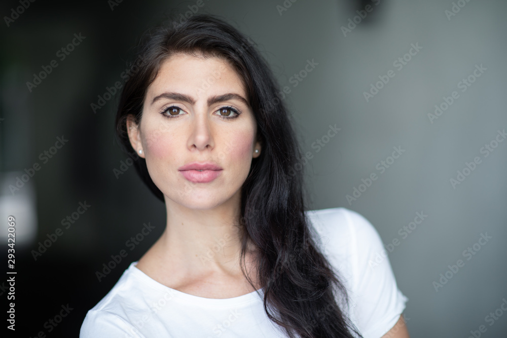 A portrait of a lovely romantic young woman outdoors, inspiringly looking forward A portrait of a lovely romantic young woman outdoors, inspiringly looking forward