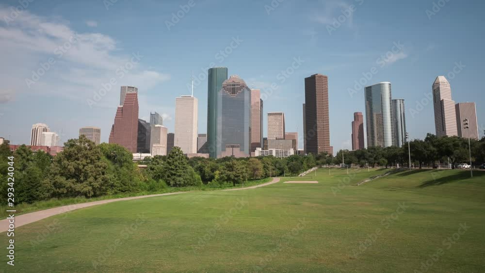 Time lapse of downtown Houston cityscape on a sunny day Time lapse of downtown Houston cityscape on a sunny day