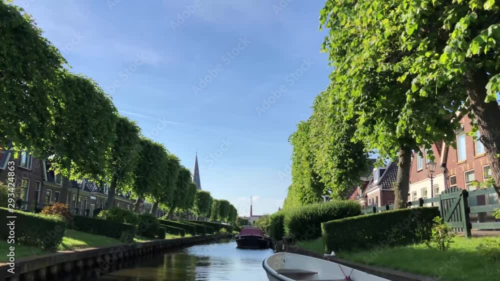 Canal in IJlst, Friesland The Netherlands Canal in IJlst, Friesland The Netherlands