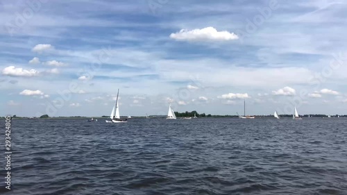 Sailing on a lake in Friesland, The Netherlands photo