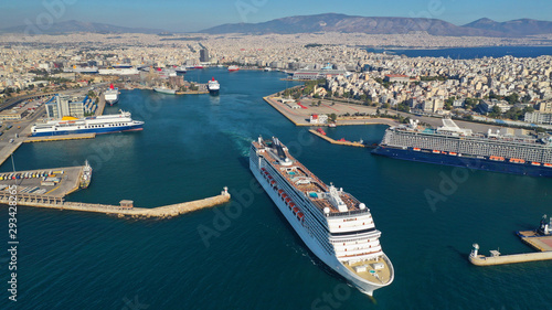 Aerial photo of luxury cruise liner leaving famous busy port of Piraeus one of the largest in Mediterranean, Attica, Greece