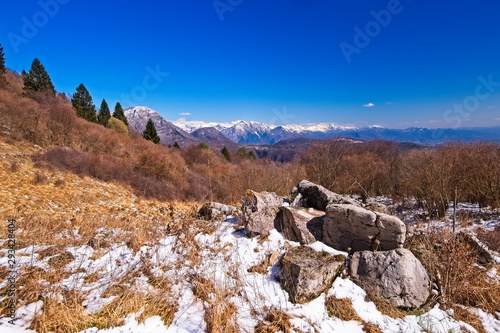 Mountain panorama in fall season with blue sky and clouds. Alps Italy. Friuli.