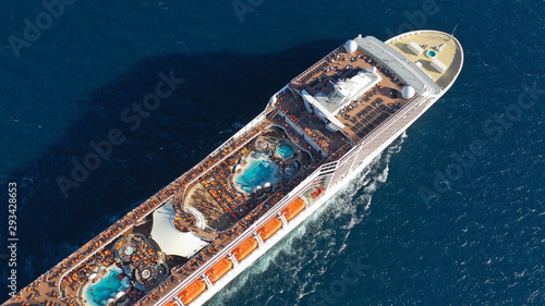 Aerial photo of large cruise liner ship cruising deep blue open ocean sea © aerial-drone