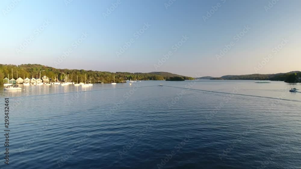 4K Aerial of a Scottish lake in the Highlands. blue still waters in a British summer tourist nature landscape in Scotland. 4K Aerial of a Scottish lake in the Highlands. blue still waters in a British summer tourist nature landscape in Scotland.