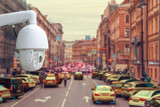 The concept of video surveillance and security technology. CCTV camera tracks violators of traffic rules during traffic congestion