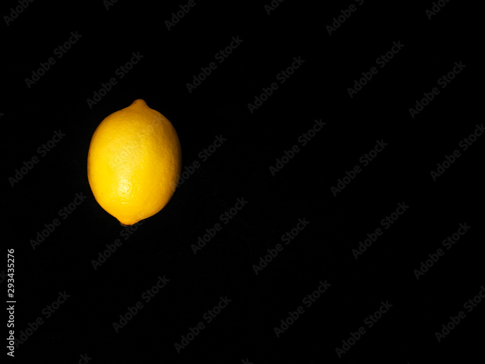 organic lemon on black background organic lemon on black background