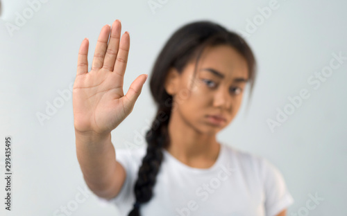 Wallpaper Mural Asian girl making stop gesture with her palm Torontodigital.ca