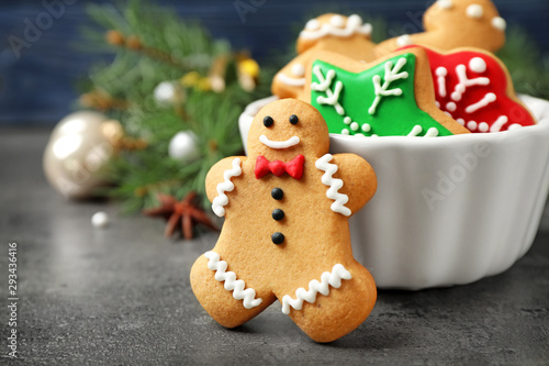 Tasty homemade Christmas cookies on grey table, closeup view