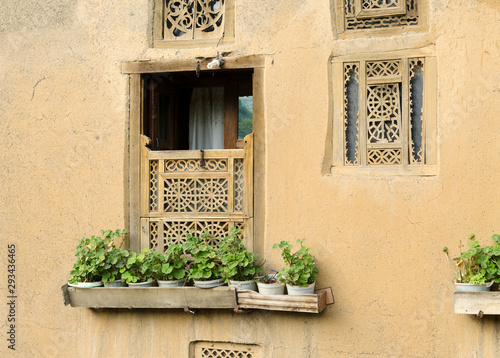 Rustic house windows, Masuleh village, Gilan province, Iran photo