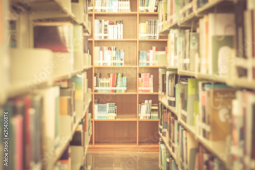 Blured books in public library,Vintage style photo with custom white balance, color filters