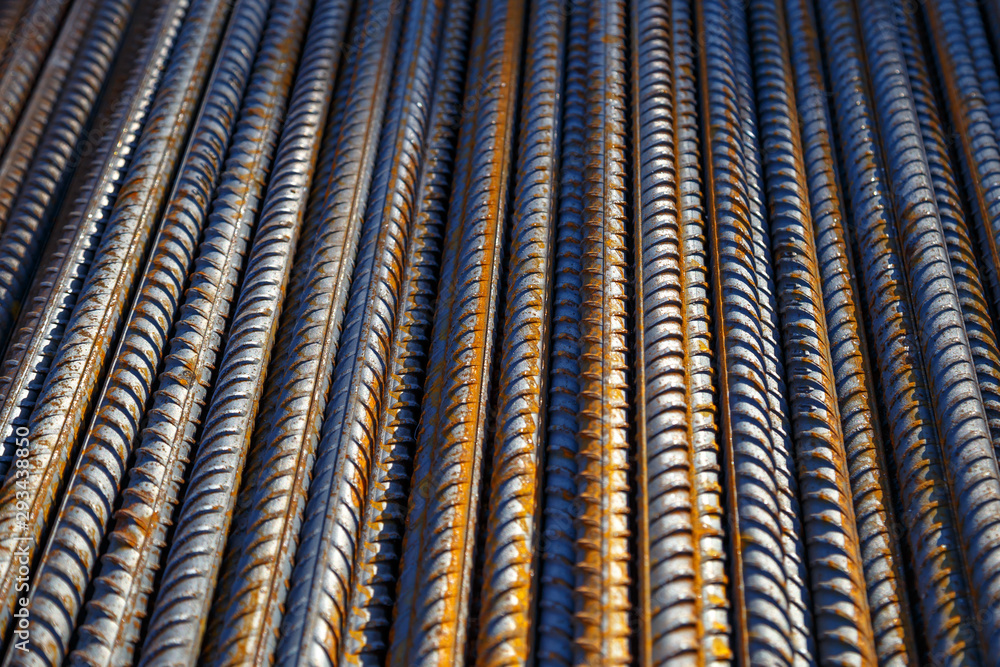 Industrial background. Rebar texture. Rusty rebar for concrete pouring. Steel reinforcement bars. Construction rebar steel work reinforcement. Closeup of Steel rebars. Industrial background. Rebar texture. Rusty rebar for concrete pouring. Steel reinforcement bars. Construction rebar steel work reinforcement. Closeup of Steel rebars.