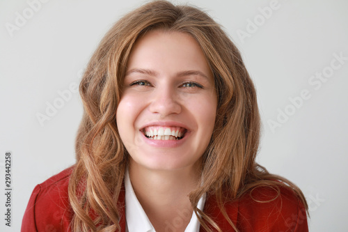 Portrait of happy young bus...